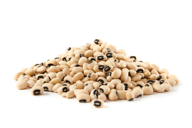 Heap of black eyed peas on white background.